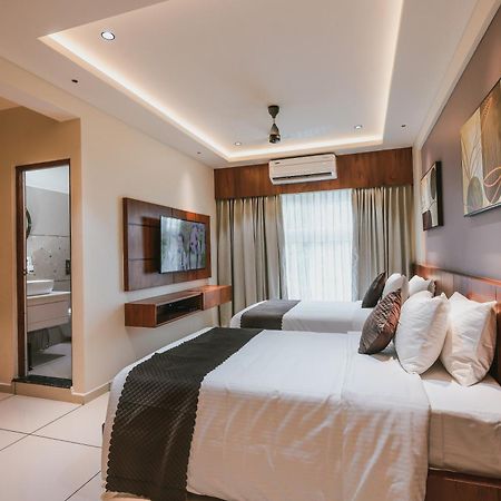 Fortview Suites Kasaragod Bagian luar foto