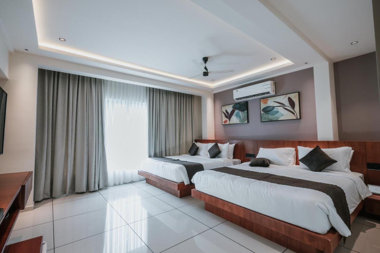 Fortview Suites Kasaragod Bagian luar foto
