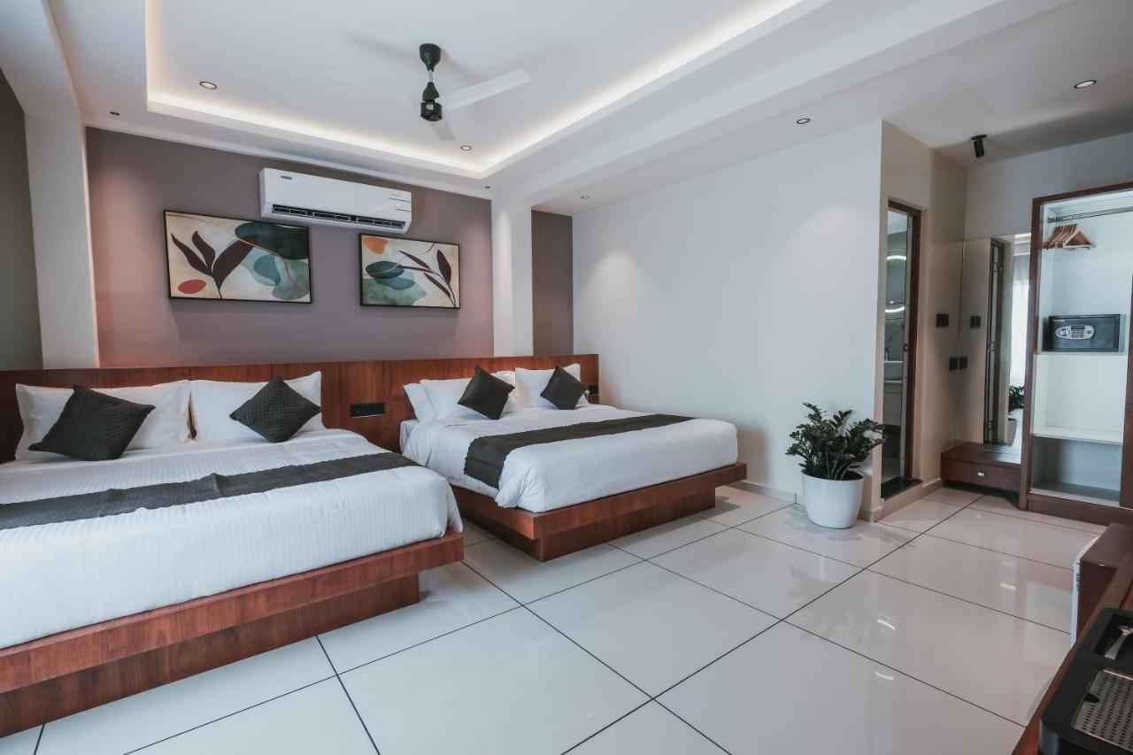 Fortview Suites Kasaragod Bagian luar foto
