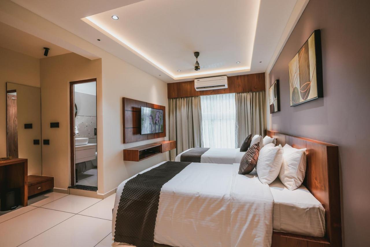 Fortview Suites Kasaragod Bagian luar foto