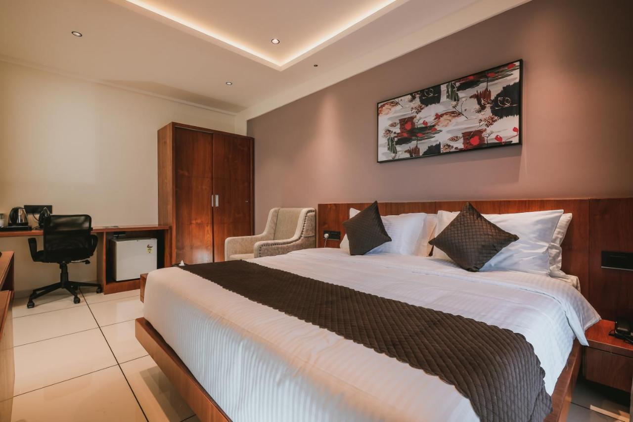 Fortview Suites Kasaragod Bagian luar foto