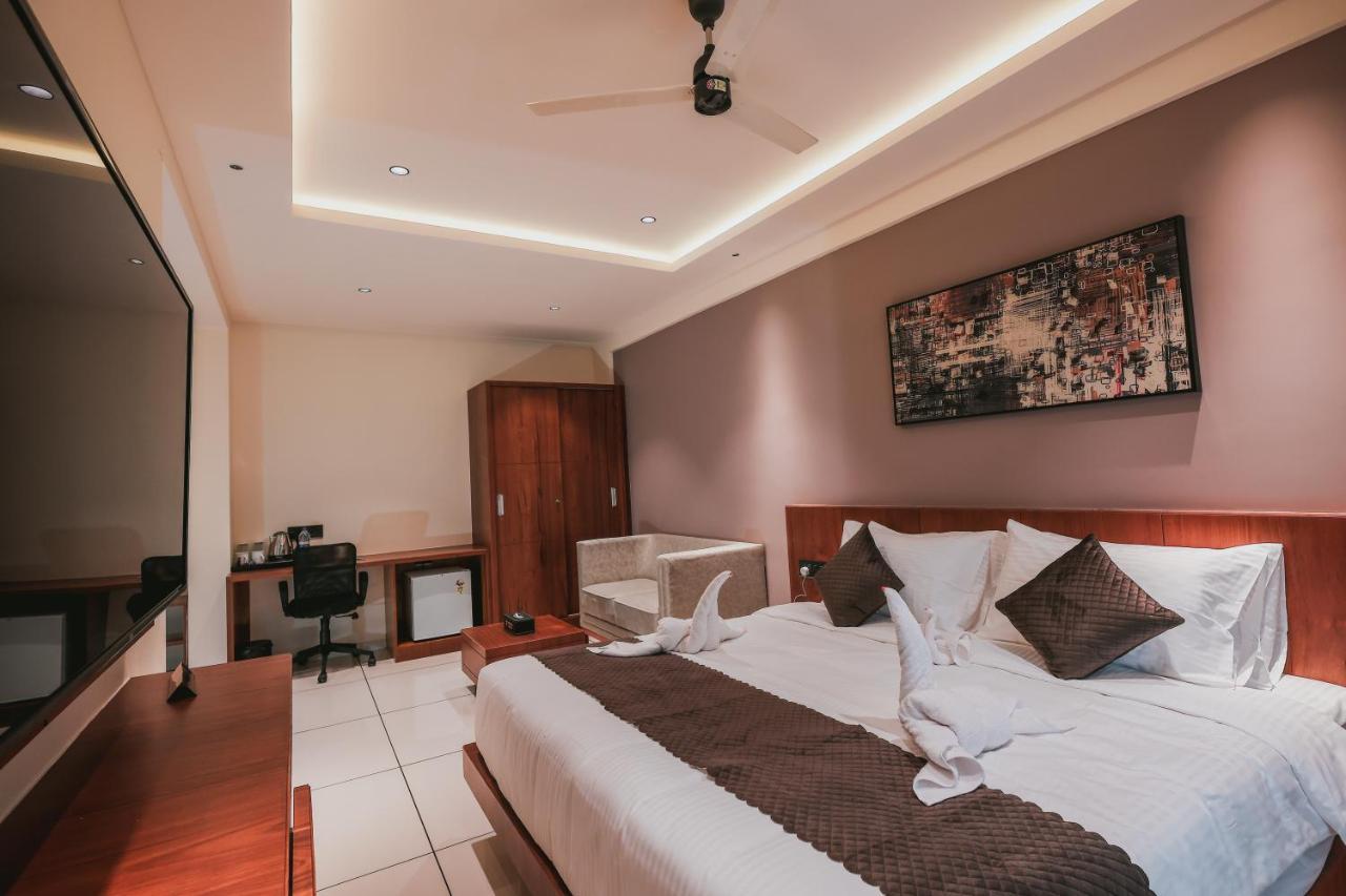 Fortview Suites Kasaragod Bagian luar foto