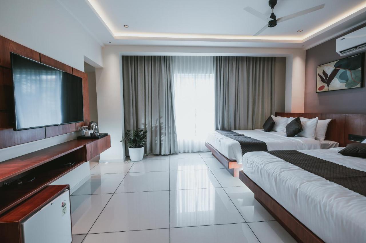 Fortview Suites Kasaragod Bagian luar foto