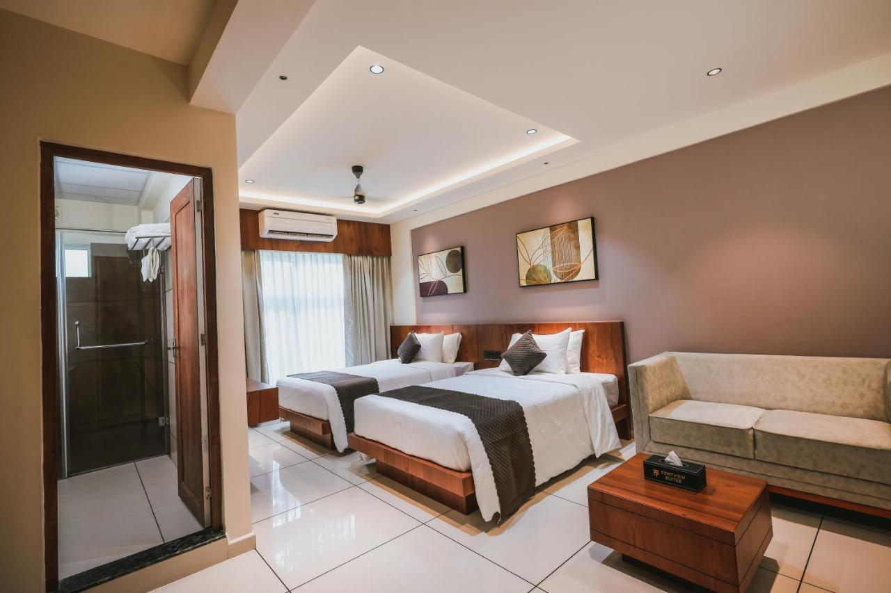 Fortview Suites Kasaragod Bagian luar foto